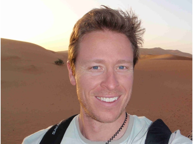 Darren Southwell selfie in a desert.