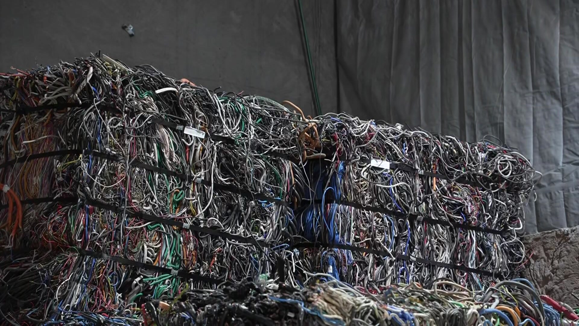 a large storage of plastic ropes stacked. 