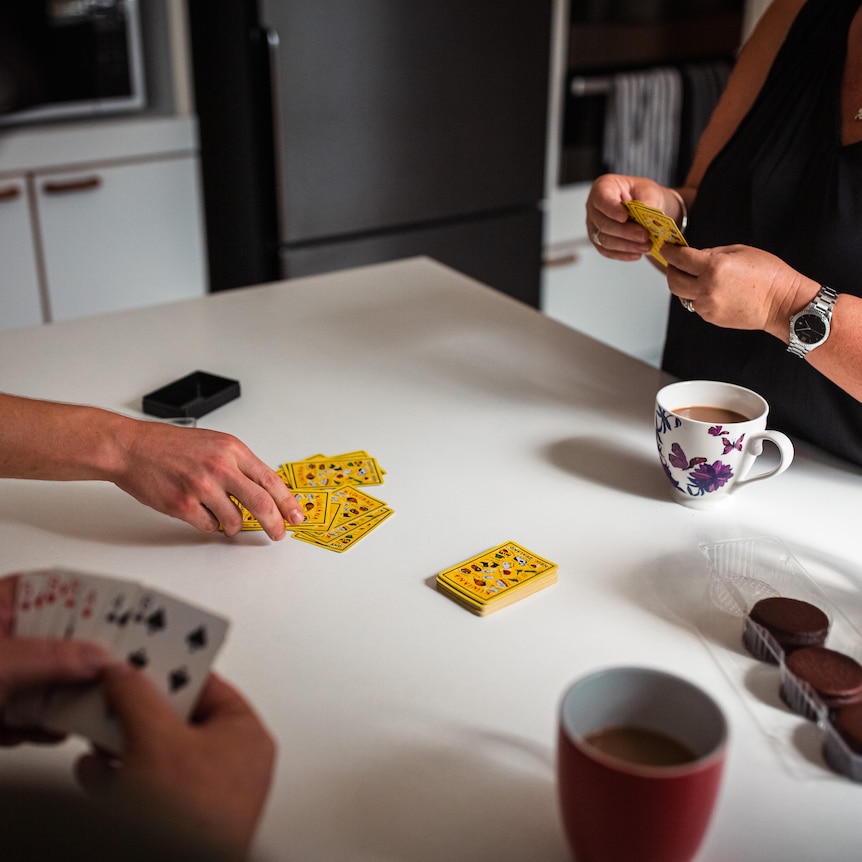 Women playing a card game