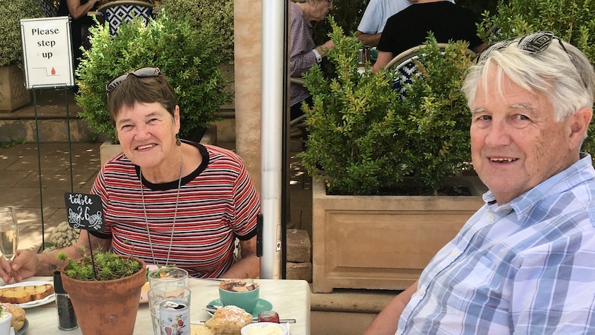 Ross and Marianne Allan dining at a table.