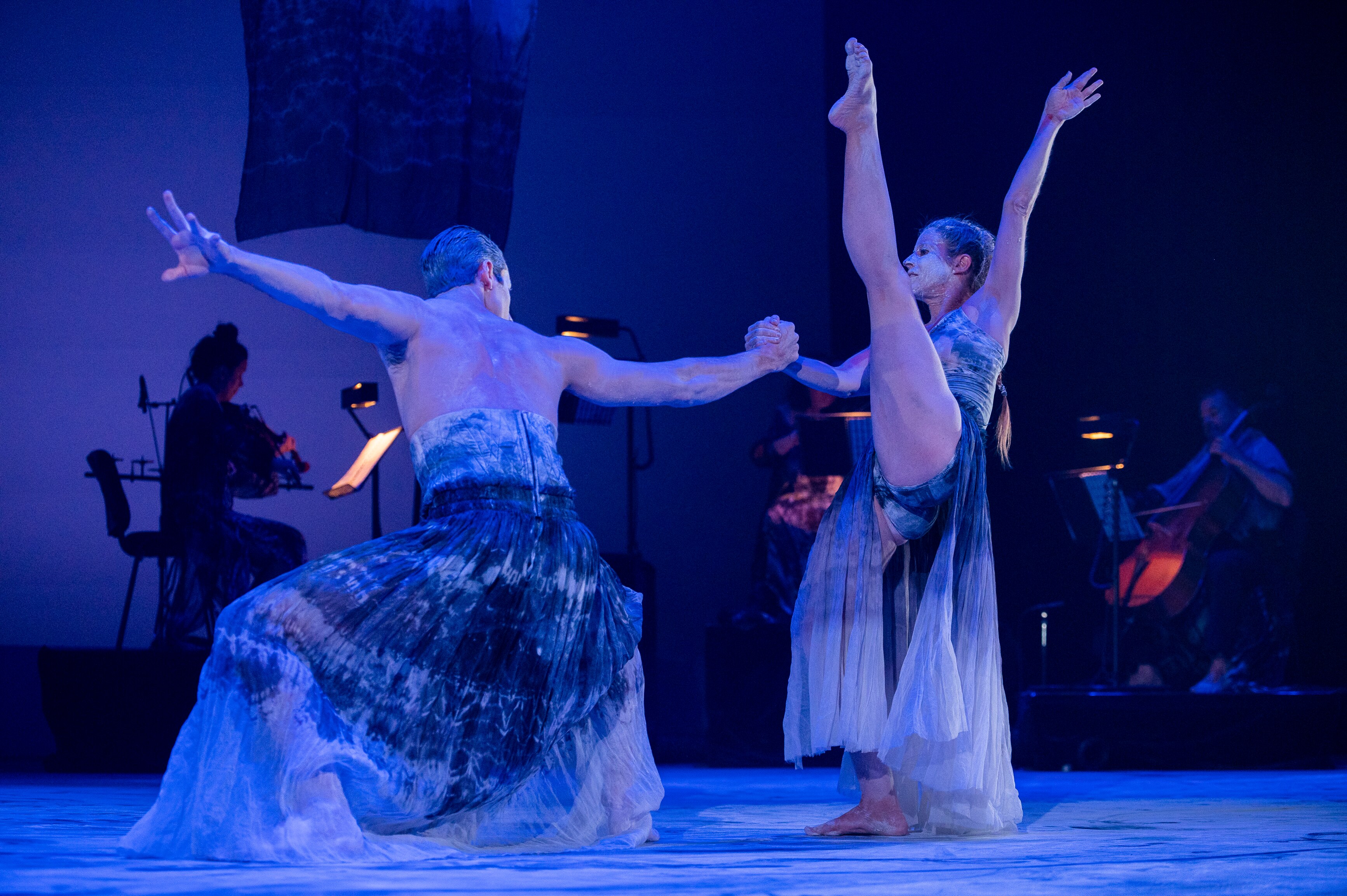 Two dancers perform the spirit's journey.