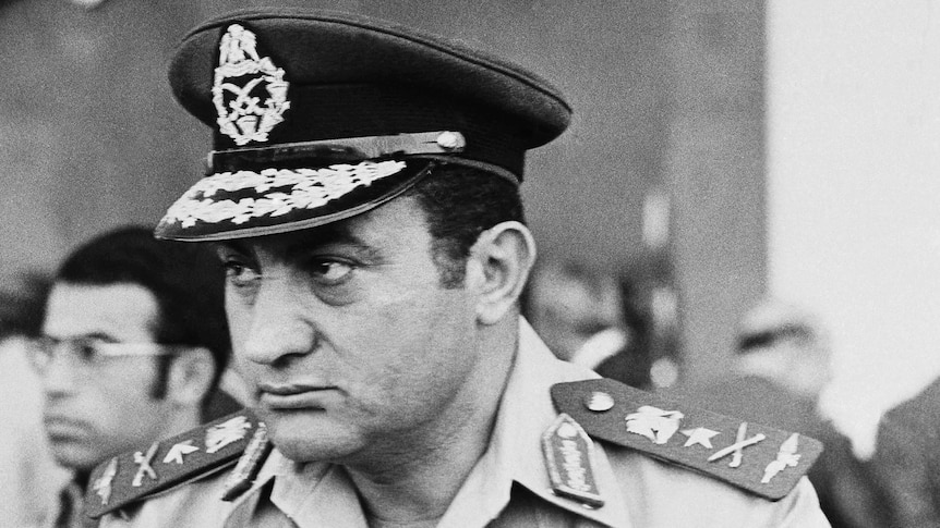 A black and white picture of Hosni Mubarak in 1974.