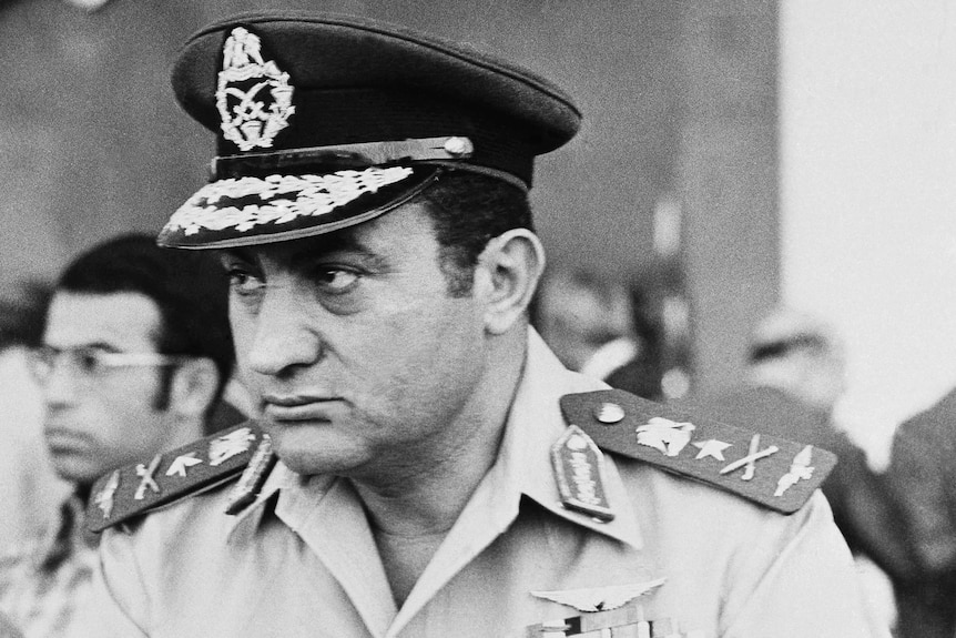 A black and white picture of Hosni Mubarak in 1974.