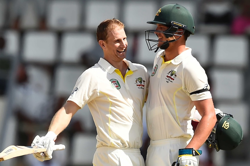 Adam Voges celebrates his century with Josh Hazlewood