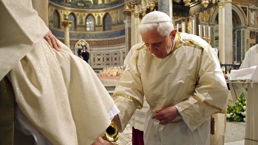 Pope Benedict XVI performs a ritual 'washing of the feet'