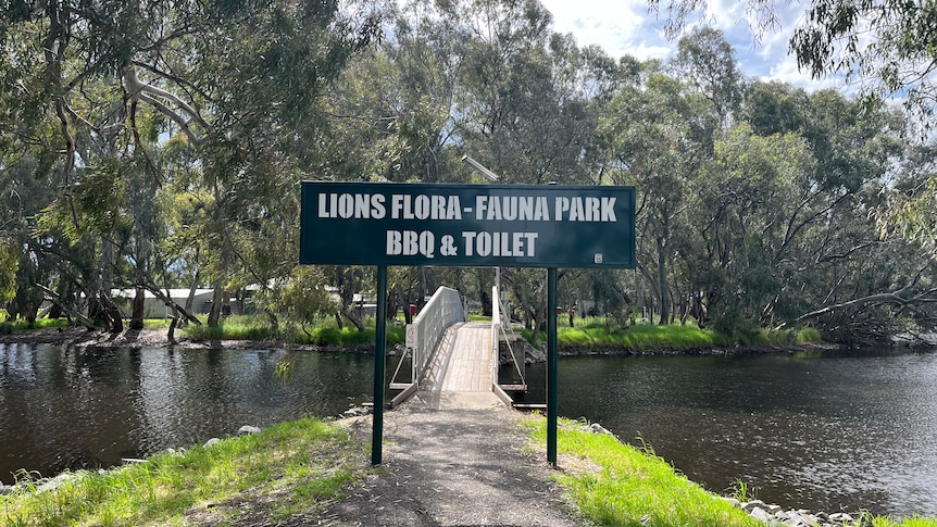A sign reading Lions Flora-Fauna Park BBQ & Toilet