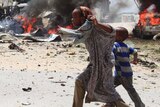 Somali children run for cover