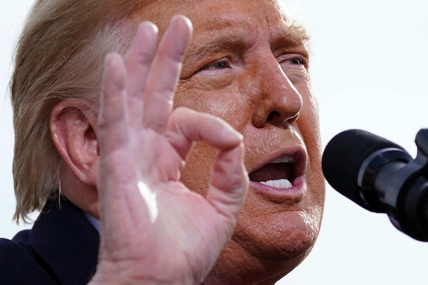 President Donald Trump speaks at a campaign rally at Manchester-Boston Regional Airport