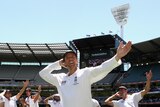 Graeme Swann leads the England team in a victorious rendition of the Sprinkler dance.
