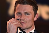 Patrick Dangerfield kisses Brownlow Medal