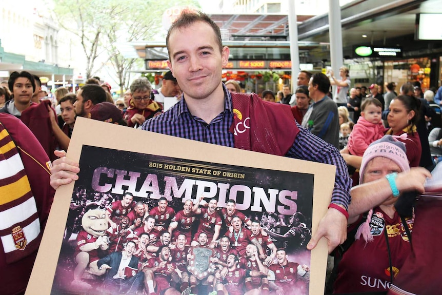 Maroons fan Greg Forno queueing in the mall