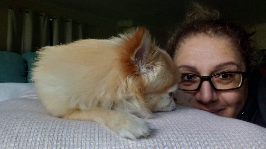 A woman and her pet dog 