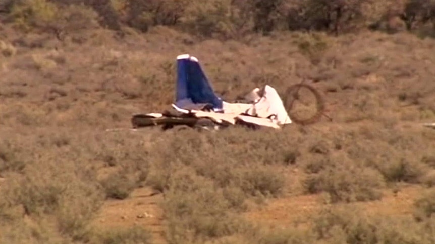 The wreckage of a Brumby 610 light plane surrounded by scrub.