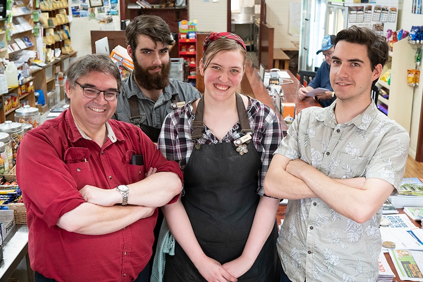 David Bruggeman and his family inside the Wingello General Store following the bushfires, January 2020.