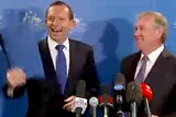 Prime Minister Tony Abbott shares a joke with WA Premier Colin Barnett