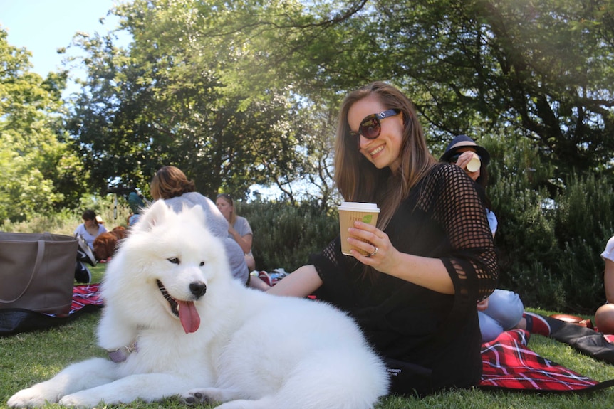 Kylie Moir enjoys a coffee with her Samoyed, Delilah