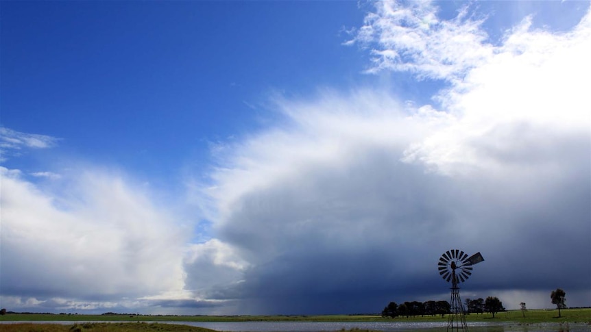 Rain cloud over farm