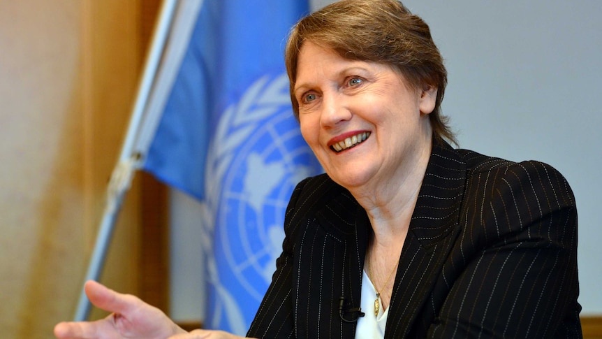 Former NZ prime minister Helen Clark speaks at a desk.