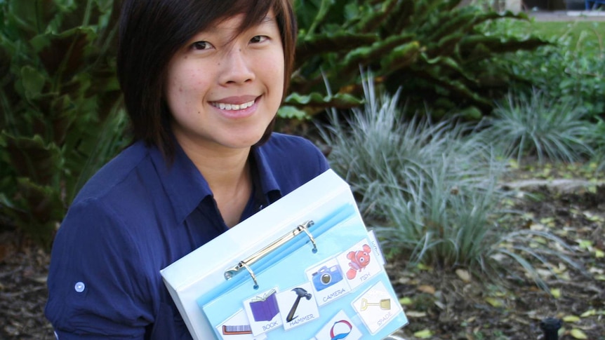 Cherie Chan with the book showing the method used