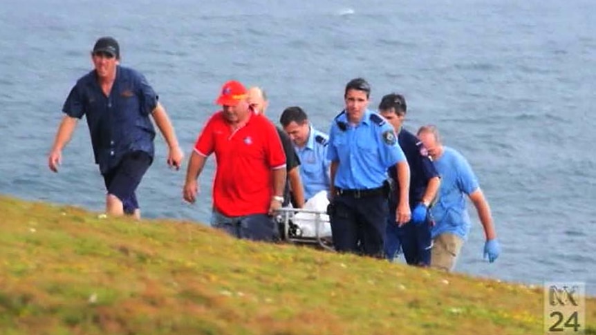 Ambulance workers at Woolgoolga beach