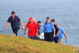 Ambulance workers at Woolgoolga beach