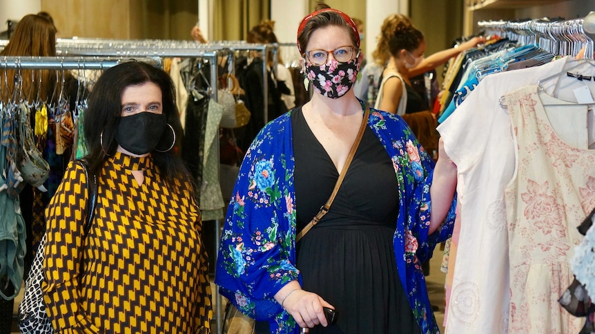 Inclusive stylist Amanda Fox and Sydney woman Amy Cutler in a fashion shop.