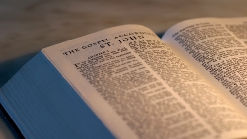 A Bible lays open on a desk (Thinkstock: Hemera)