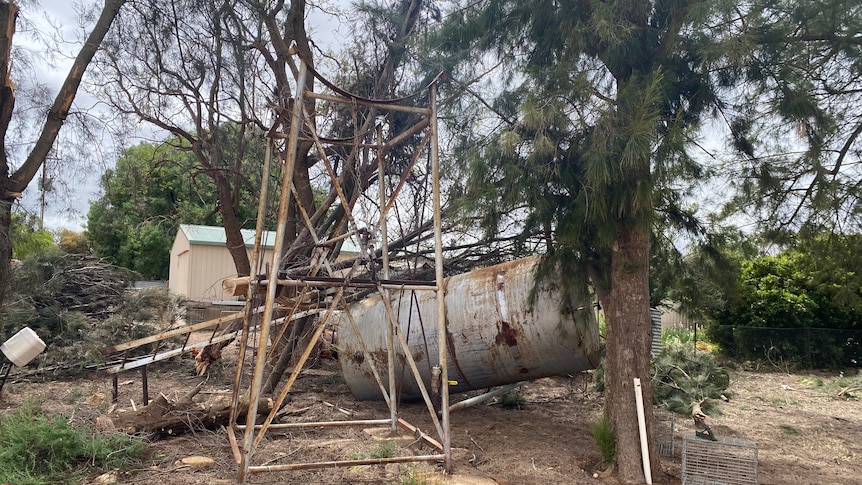 A fuel tank blown over by huge winds in at a farm in Pyap. 