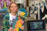 Newcastle skateboarders Poppy Starr Olsen in front of a camera in a Newcastle laneway for a documentary film in June 2017.