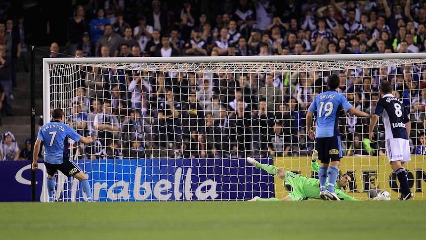 Brett Emerton was denied from the spot by an inspired Ante Covic.
