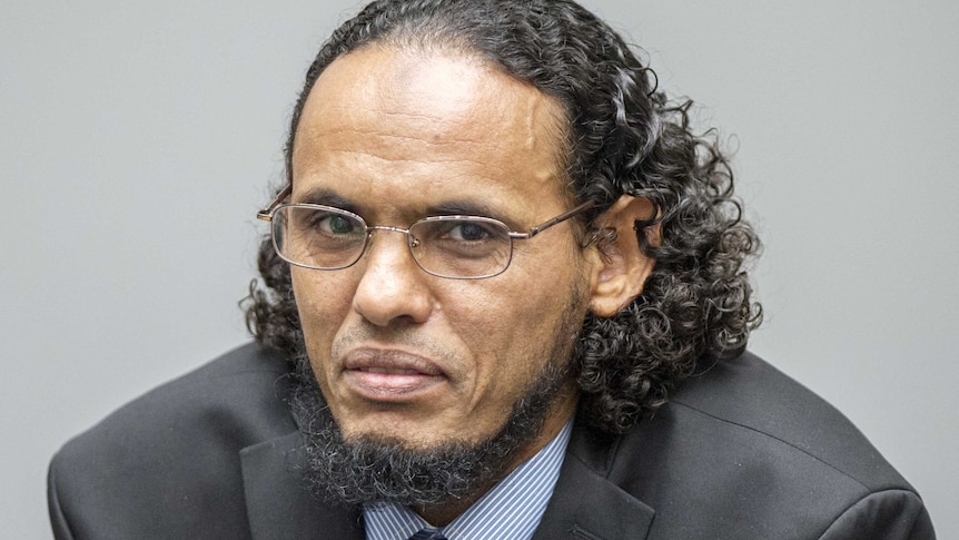 Alleged Al-Qaeda-linked Islamist leader Ahmad Al Faqi Al Mahdi looks on during an appearance at the Hague, August 22 2016.