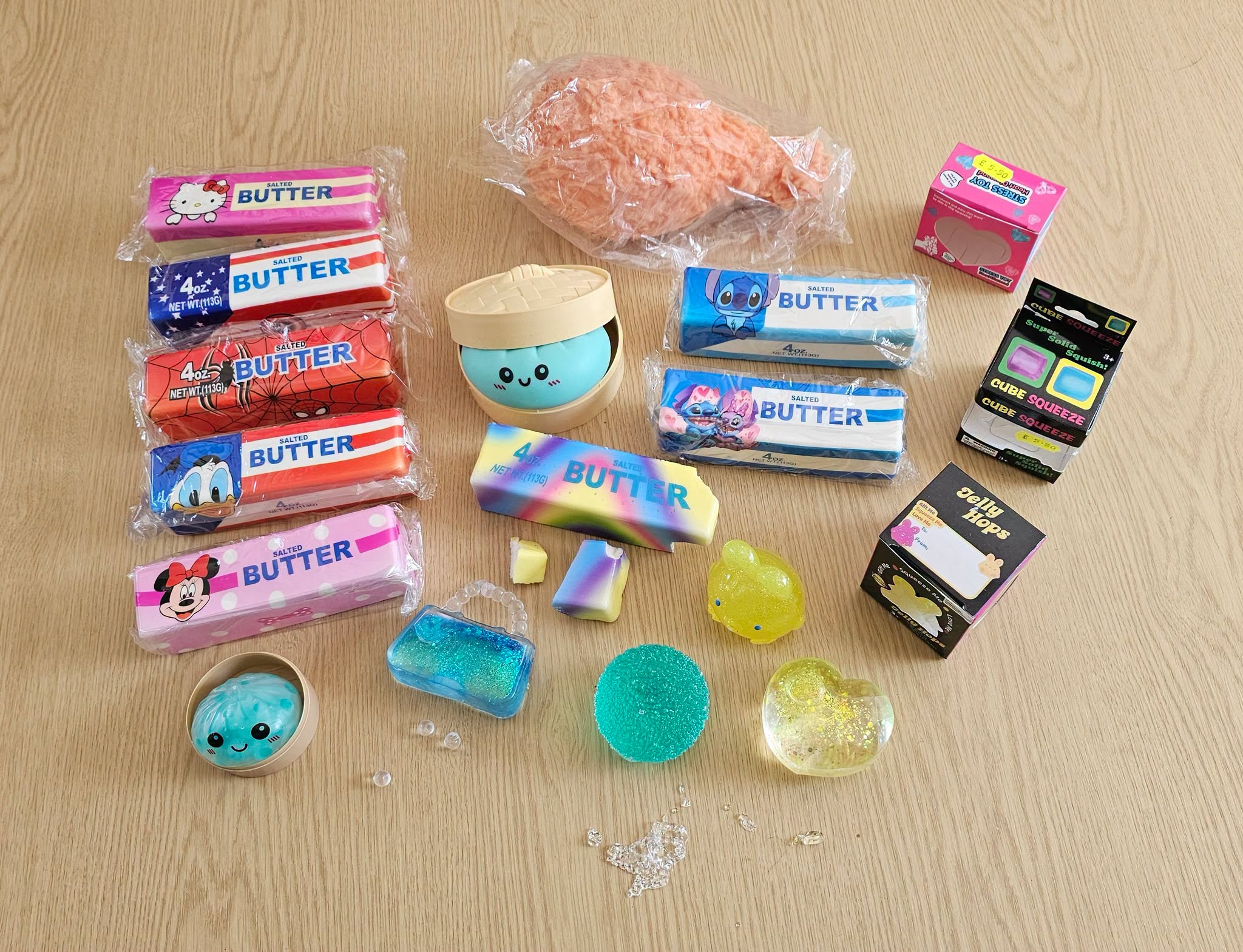 Squishy butters, dumplings and cubes laid out on a table.