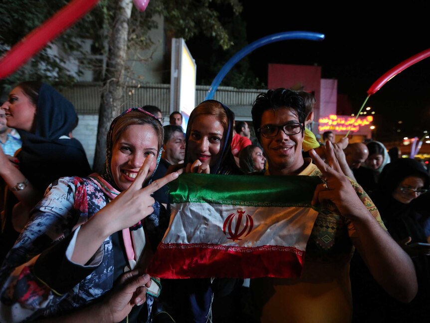 Iranian women celebrate the signing of the nuclear deal in northern Tehran.