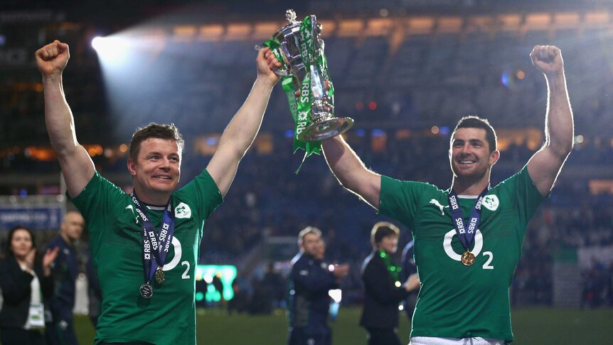 Ireland's Brian O'Driscoll and Dean Kearney celebrate with the Six Nations trophy.