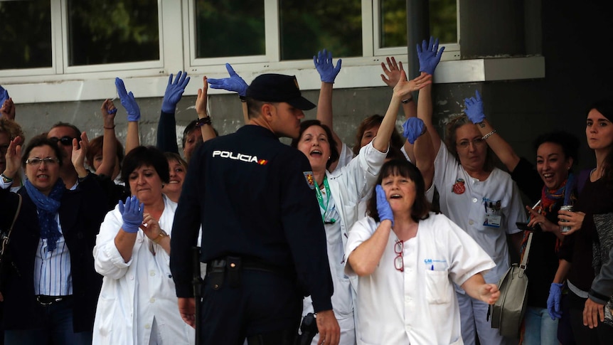 Health workers protest outside Madrid hospital