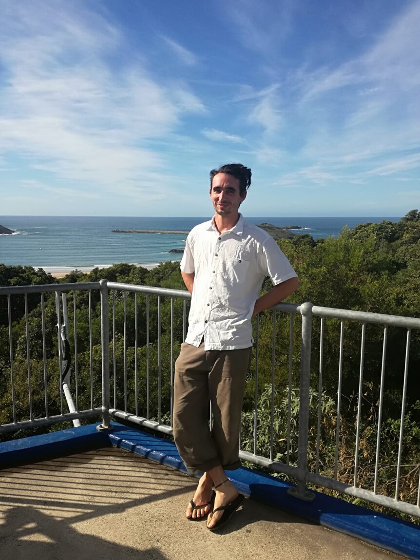 French national Yann Buriet on a viewing platform in front of a beach