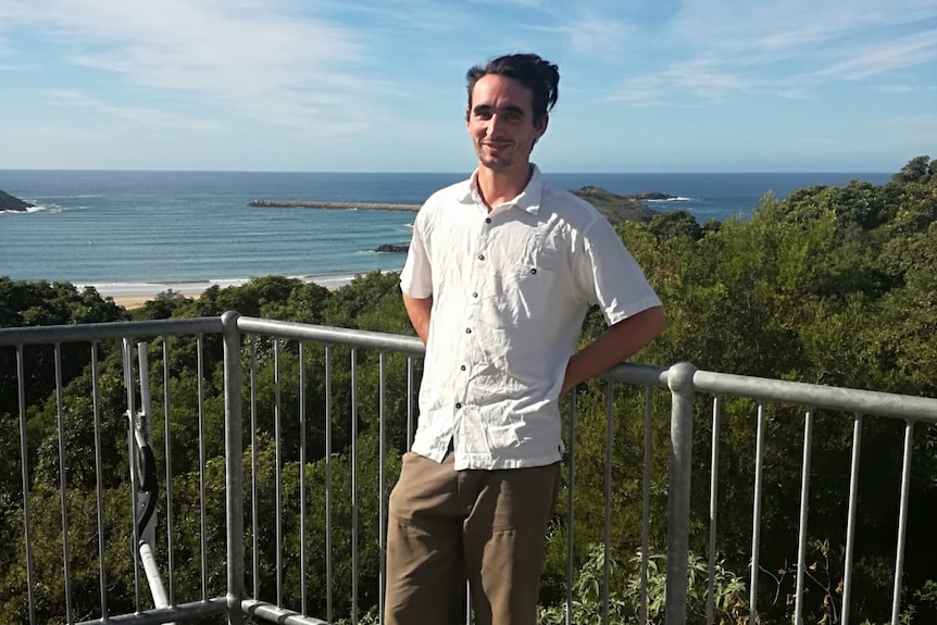 French national Yann Buriet on a viewing platform in front of a beach