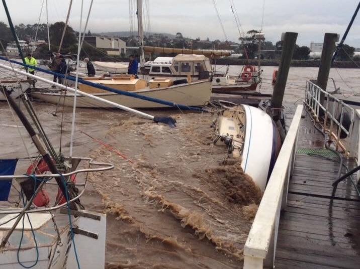 MYC members trying to save their yachts from the flood.