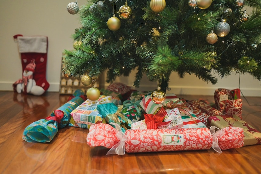 Christmas presents under a tree.