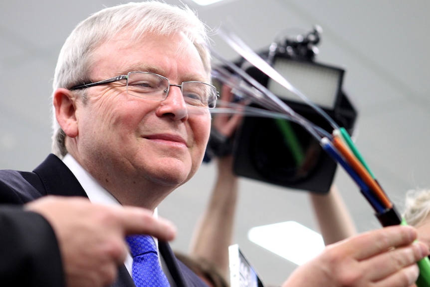 Kevin Rudd inspects cabling to be used for the NBN