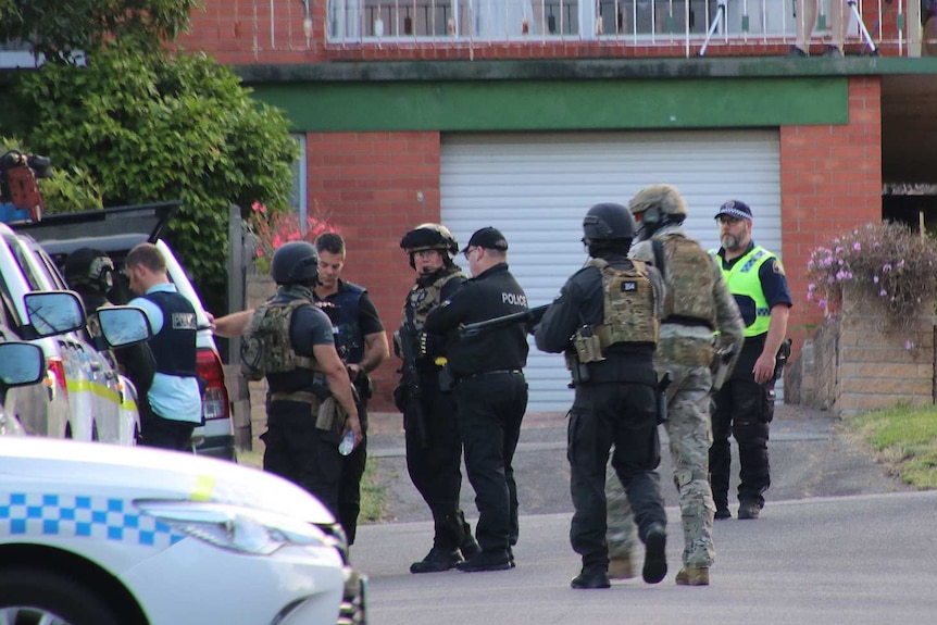 Tasmania Police at Launceston siege.
