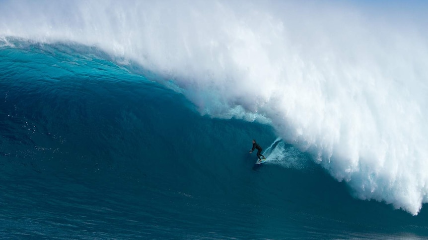 Surfer Mick Corbett rides the Cow Bombie off WA's South-West coast