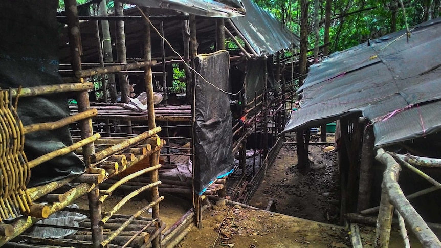 This undated handout photo made available on May 25, 2015 by the Royal Malaysian Police shows an abandoned migrant detention camp used by people-smugglers in a jungle near the Malaysia-Thailand border