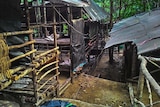 This undated handout photo made available on May 25, 2015 by the Royal Malaysian Police shows an abandoned migrant detention camp used by people-smugglers in a jungle near the Malaysia-Thailand border
