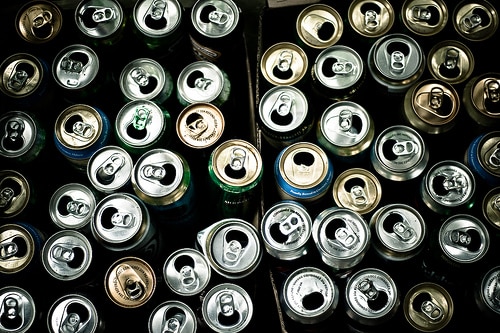 A heap of empty beer cans grouped together