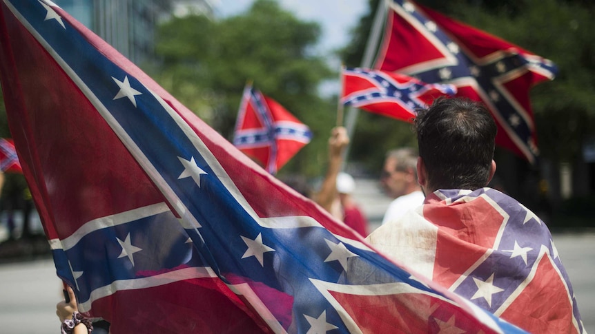 Pro-confederate flag demonstrators march to the South Carolina state house in Columbia 10 days after the Charleston massacre.