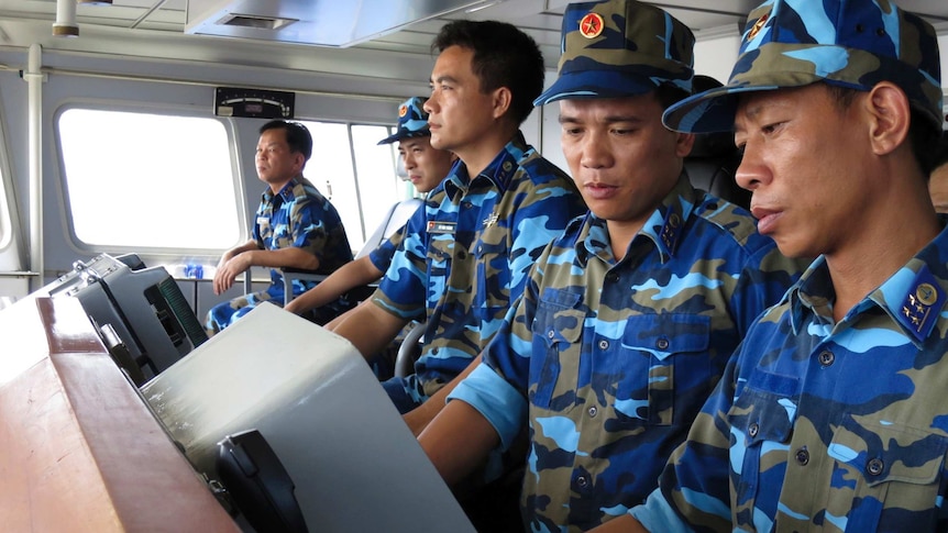 Crewmen aboard Vietnam coastguard ship