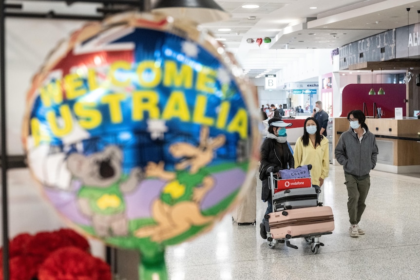 a balloon which says welcome to australia at an airport