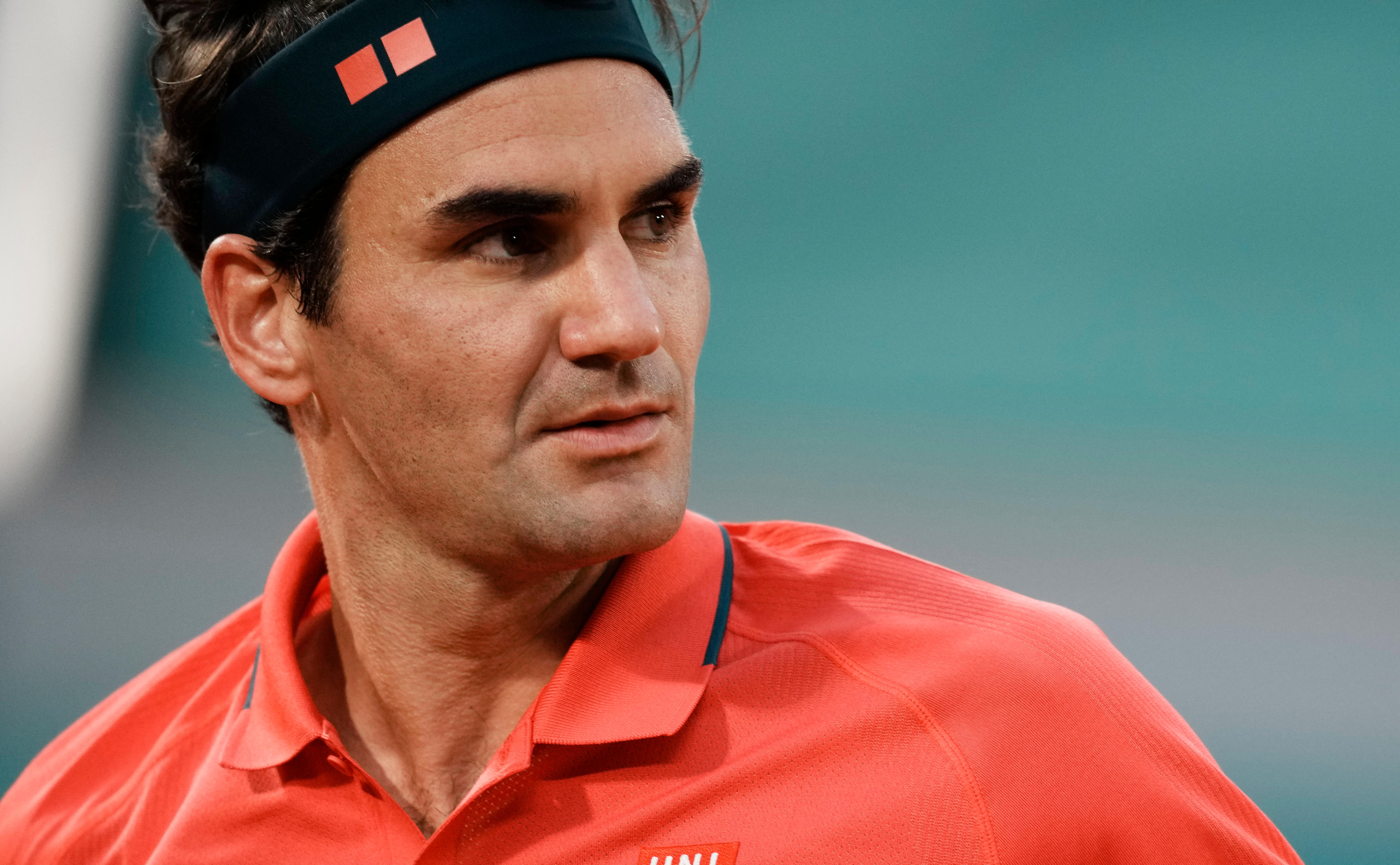 Switzerland's Roger Federer walks back to the service line ready to receive serve