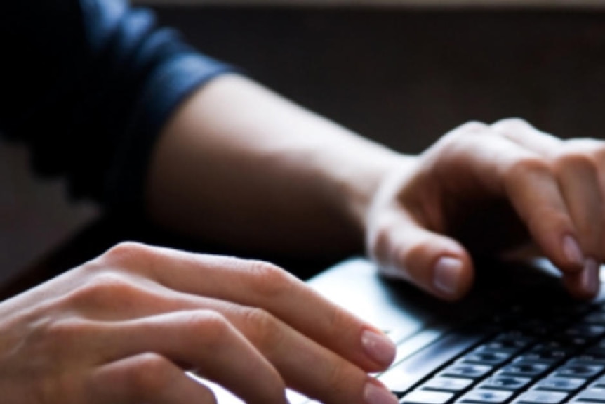 Female hands typing on keyboard (Thinkstock)